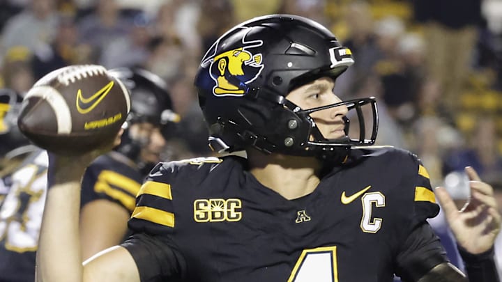 Sep 19, 2024; Boone, North Carolina, USA;  Appalachian State Mountaineers quarterback Joey Aguilar (4) throws a pass against the South Alabama Jaguars during the second quarter at Kidd Brewer Stadium. Mandatory Credit: Reinhold Matay-Imagn Images