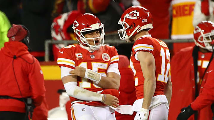 Jan 20, 2019; Kansas City, MO, USA; Kansas City Chiefs quarterback Patrick Mahomes (15) celebrates with Chiefs wide receiver Gehrig Dieter (12) after a touchdown against the New England Patriots during the second half of the AFC Championship game at Arrowhead Stadium. Mandatory Credit: Jay Biggerstaff-Imagn Images