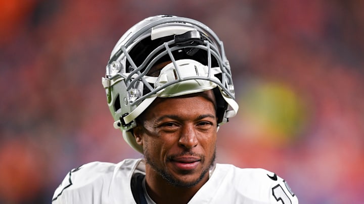 Tyler Lockett of the Las Vegas Raiders looks on