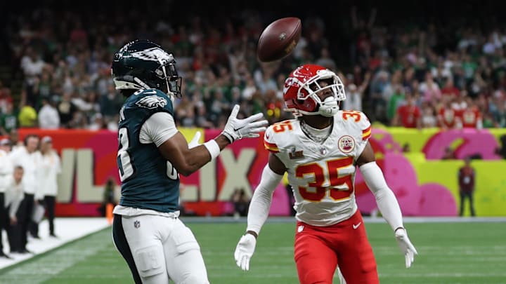 Feb 9, 2025; New Orleans, LA, USA; Philadelphia Eagles wide receiver Jahan Dotson (83) catches a pass as Kansas City Chiefs cornerback Jaylen Watson (35) defends during Super Bowl LIX at Caesars Superdome. Mandatory Credit: Geoff Burke-Imagn Images
