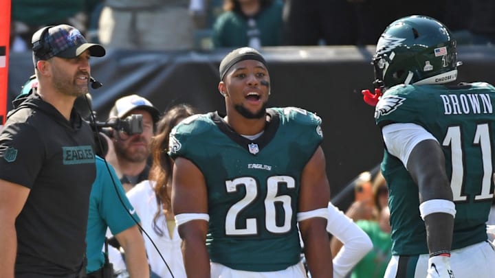 Oct 13, 2024; Philadelphia, Pennsylvania, USA; Philadelphia Eagles head coach Nick Sirianni and running back Saquon Barkley (26) celebrate touchdown catch by wide receiver A.J. Brown (11) against the Cleveland Browns during the second quarter at Lincoln Financial Field. Mandatory Credit: Eric Hartline-Imagn Images