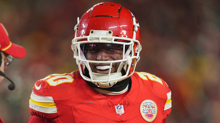 Jan 18, 2025; Kansas City, Missouri, USA; Kansas City Chiefs head coach Andy Reid (left) talks with safety Justin Reid (20) during the fourth quarter of a 2025 AFC divisional round game against the Houston Texans at GEHA Field at Arrowhead Stadium. Mandatory Credit: Jay Biggerstaff-Imagn Images