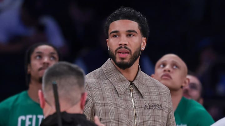 Oct 24, 2025; New York, New York, USA;  Boston Celtics guard Jayson Tatum, center, looks on during the fourth quarter against the New York Knicks at Madison Square Garden. Mandatory Credit: Vincent Carchietta-Imagn Images