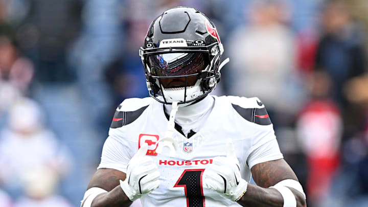 Oct 13, 2024; Foxborough, Massachusetts, USA; Houston Texans wide receiver Stefon Diggs (1) reacts before a game against the New England Patriots at Gillette Stadium. Mandatory Credit: Brian Fluharty-Imagn Images