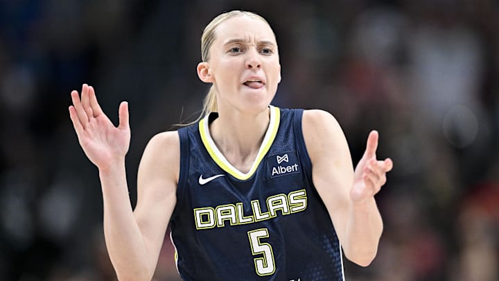 Jun 27, 2025; Dallas, Texas, USA; Dallas Wings guard Paige Bueckers (5) celebrates during the second half against the Indiana Fever at the American Airlines Center. Mandatory Credit: Jerome Miron-Imagn Images