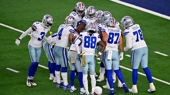 Dallas Cowboys quarterback Dak Prescott huddles with the offense during the game against the Arizona Cardinals. Dallas Cowboys quarterback Dak Prescott huddles with the offense during the game against the Arizona Cardinals.