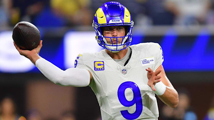Oct 24, 2024; Inglewood, California, USA; Los Angeles Rams quarterback Matthew Stafford (9) throws against the Minnesota Vikings during the first half at SoFi Stadium. Mandatory Credit: Gary A. Vasquez-Imagn Images