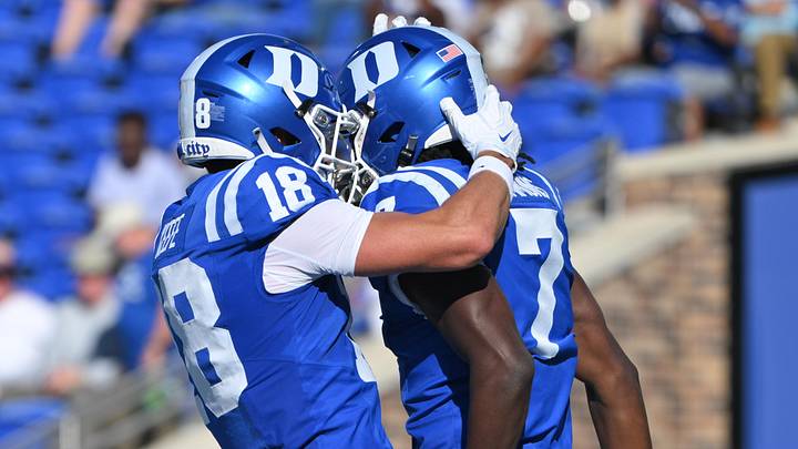 Sep 26, 2026; Durham, North Carolina, USA; Duke Blue Devils wide receiver Brody Keefe (18) celebrates a touchdown by wide receiver Kavon Simmons (7) against the William & Mary Tribe during the second quarter at Wallace Wade Stadium. Mandatory Credit: Zachary Taft-Imagn Images Sep 26, 2026; Durham, North Carolina, USA; Duke Blue Devils wide receiver Brody Keefe (18) celebrates a touchdown by wide receiver Kavon Simmons (7) against the William & Mary Tribe during the second quarter at Wallace Wade Stadium. Mandatory Credit: Zachary Taft-Imagn Images