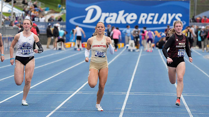 Sioux City East’s Grace Erick, Waukee Northwest ’s Katie Willits, Assumption Davenport’s Kelly Grobstich, Pella Christian’s Rachel Kacmarynski and Southeast Polk’s Alayna Goldsberry finishes girls 100-meter dash in the Drake relays at Drake Stadium on April 25, 2025, in Des, Moines, Iowa