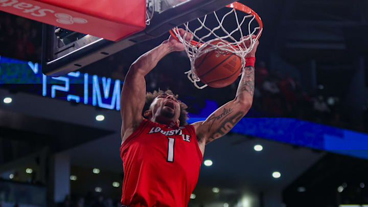 Feb 1, 2025; Atlanta, Georgia, USA; Louisville Cardinals guard J'Vonne Hadley (1) dunks against the Georgia Tech Yellow Jackets in the first half at McCamish Pavilion. Feb 1, 2025; Atlanta, Georgia, USA; Louisville Cardinals guard J'Vonne Hadley (1) dunks against the Georgia Tech Yellow Jackets in the first half at McCamish Pavilion.