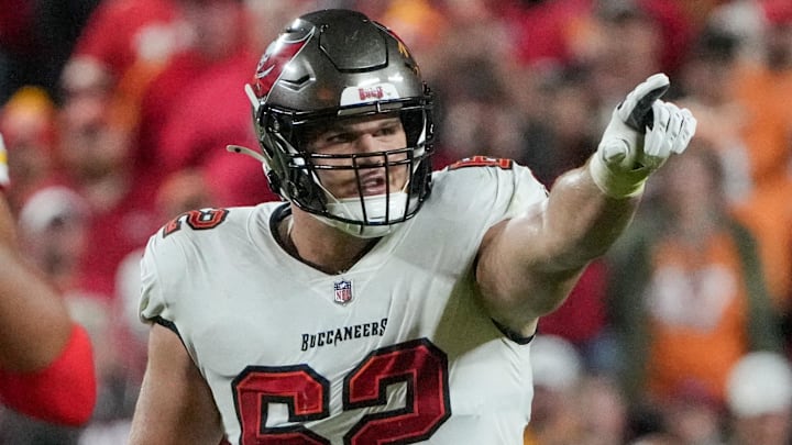 Nov 4, 2024; Kansas City, Missouri, USA; Tampa Bay Buccaneers center Graham Barton (62) gestures at the line of scrimmage against the Kansas City Chiefsduring the game at GEHA Field at Arrowhead Stadium. Mandatory Credit: Denny Medley-Imagn Images