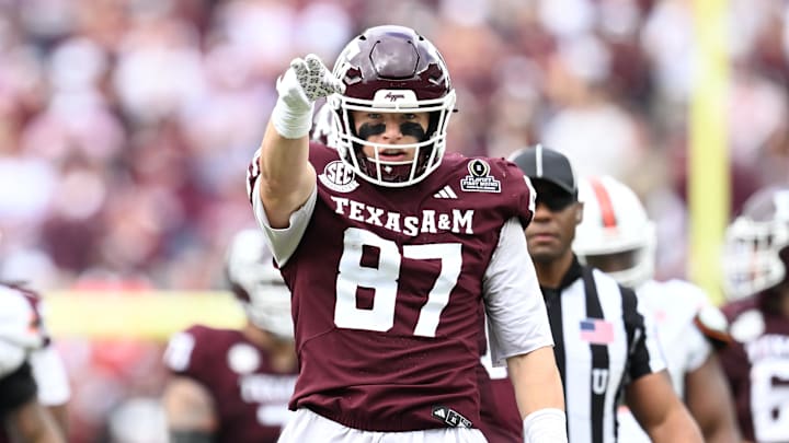 Texas A&M Aggies tight end Nate Boerkircher (87) celebrates a first down against the Miami Hurricanes during first quarter of the first round game of the CFP National Playoff at Kyle Field.