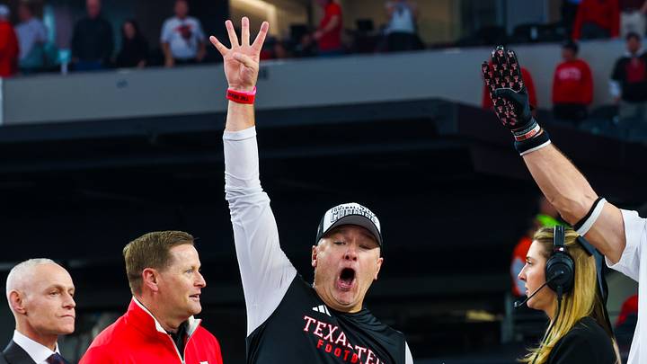 Dec 6, 2025; Arlington, TX, USA;  Texas Tech Red Raiders head coach Joey McGuire celebrates with Texas Tech Red Raiders linebacker Ben Roberts (13) after the game against the BYU Cougars at AT&T Stadium. Mandatory Credit: Kevin Jairaj-Imagn Images