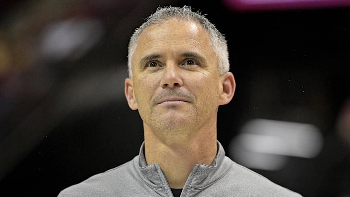 Mar 9, 2024; Tallahassee, Florida, USA; Florida State Seminoles head football coach Mike Norvell accepts the Bear Bryant coach of the Year award during a media timeout of a basketball game against the Miami Hurricanes at Donald L. Tucker Center. Mandatory Credit: Melina Myers-Imagn Images