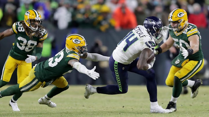 Green Bay Packers cornerback Jaire Alexander and inside linebacker Blake Martinez (50) chase Seahawks receiver D.K. Metcalf. Green Bay Packers cornerback Jaire Alexander and inside linebacker Blake Martinez (50) chase Seahawks receiver D.K. Metcalf.