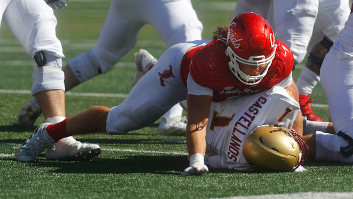 Louisville's Ashton Gillotte sacks Boston College's Thomas Castellanos Saturday afternoon in L&N Stadium.