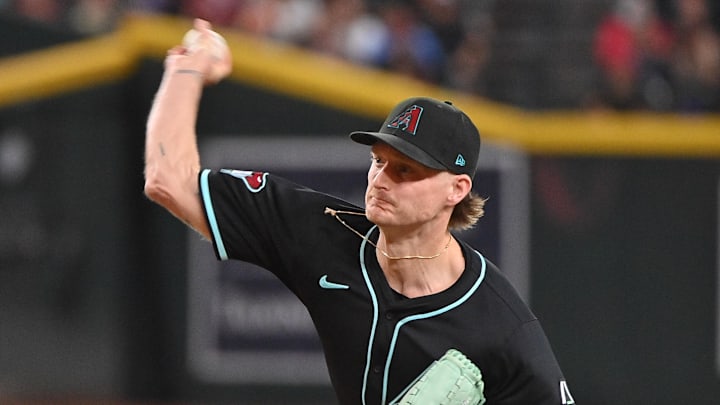 Jun 30, 2025; Phoenix, Arizona, USA;  Arizona Diamondbacks pitcher Shelby Miller (18) throws in the ninth inning against the San Francisco Giants at Chase Field. Mandatory Credit: Matt Kartozian-Imagn Images