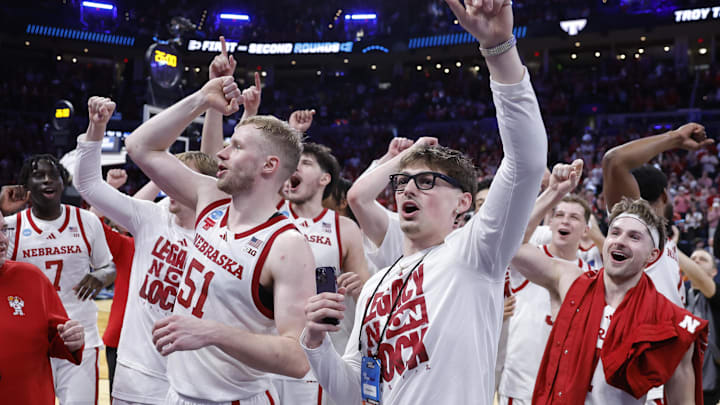 Nebraska players celebrate their first-round victory over Troy at Paycom Center in Oklahoma City.