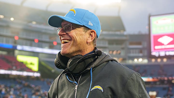 Dec 28, 2024; Foxborough, Massachusetts, USA; Los Angeles Chargers head coach Jim Harbaugh reacts after defeating the New England Patriots at Gillette Stadium. Mandatory Credit: David Butler II-Imagn Images