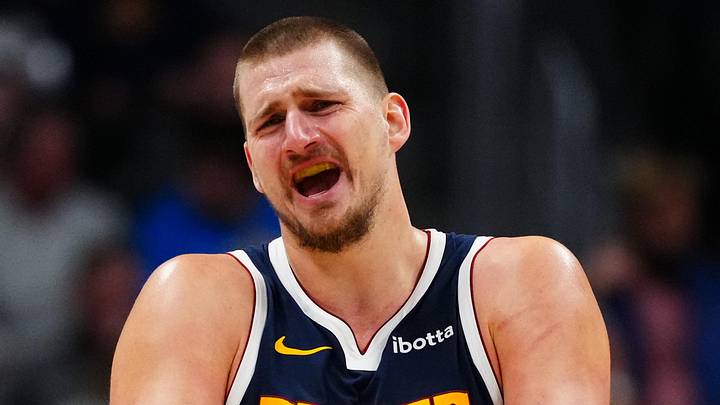 Dec 28, 2024; Denver, Colorado, USA; Denver Nuggets center Nikola Jokic (15) reacts in the fourth quarter against the Detroit Pistons at Ball Arena. Mandatory Credit: Ron Chenoy-Imagn Images