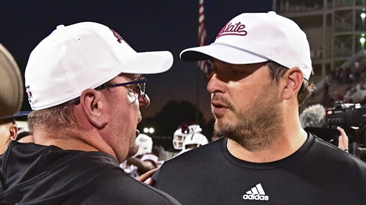 Texas A&M Aggies head coach Mike Elko  and Mississippi State Bulldogs head coach Jeff Lebby speak after a game at Davis Wade Stadium at Scott Field. 