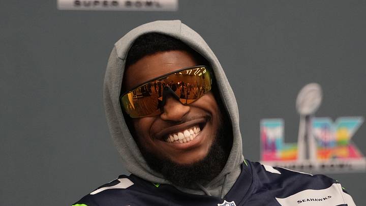 Seattle Seahawks cornerback Devon Witherspoon talks to media members