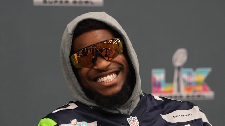 Seattle Seahawks cornerback Devon Witherspoon talks to media members