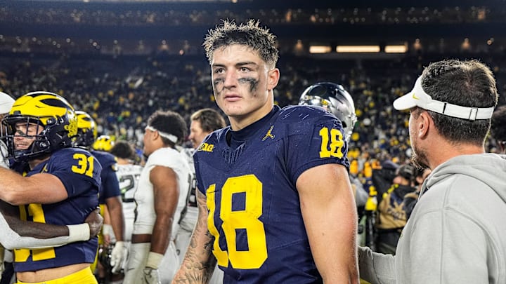 Michigan tight end Colston Loveland (18) walks off the field after 38-17 loss to Oregon at Michigan Stadium in Ann Arbor on Saturday, Nov. 2, 2024.