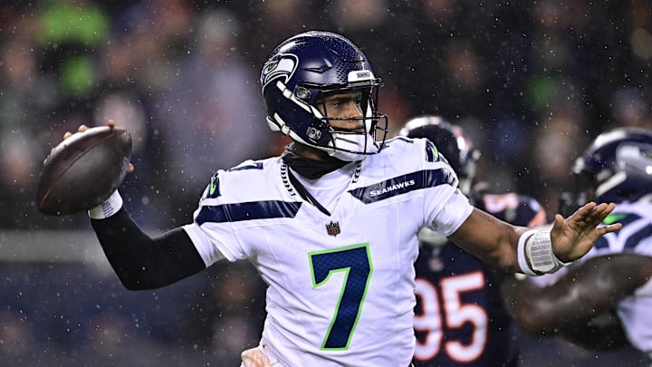 Dec 26, 2024; Chicago, Illinois, USA; Seattle Seahawks quarterback Geno Smith (7) passes the ball against the Chicago Bears during the third quarter at Soldier Field. Mandatory Credit: Daniel Bartel-Imagn Images
