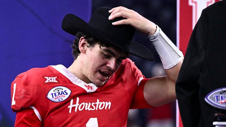Houston Cougars quarterback Conner Weigman puts on the MVP cowboy hat after the win over LSU Tigers Houston Cougars quarterback Conner Weigman puts on the MVP cowboy hat after the win over LSU Tigers