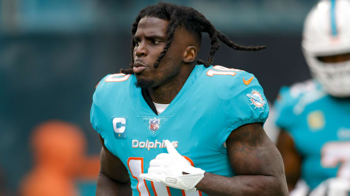 Dec 25, 2022; Miami Gardens, Florida, USA; Miami Dolphins wide receiver Tyreek Hill (10) takes to the field prior to the game against the Green Bay Packers at Hard Rock Stadium. Mandatory Credit: Sam Navarro-Imagn Images