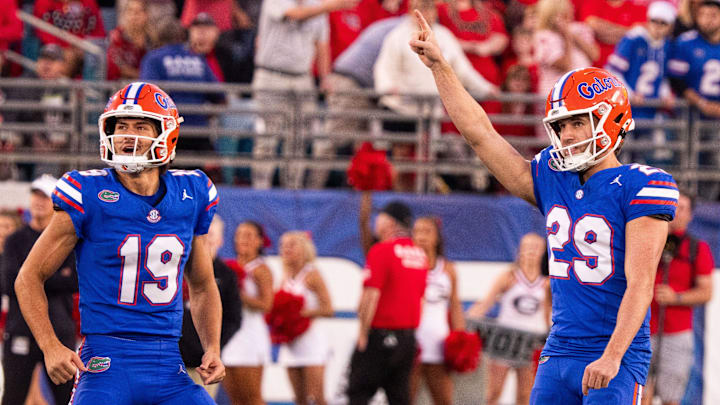 Florida Gators kicker Trey Smack (29) and punter Tommy Doman (19) each contributed to the program's history-making draft.