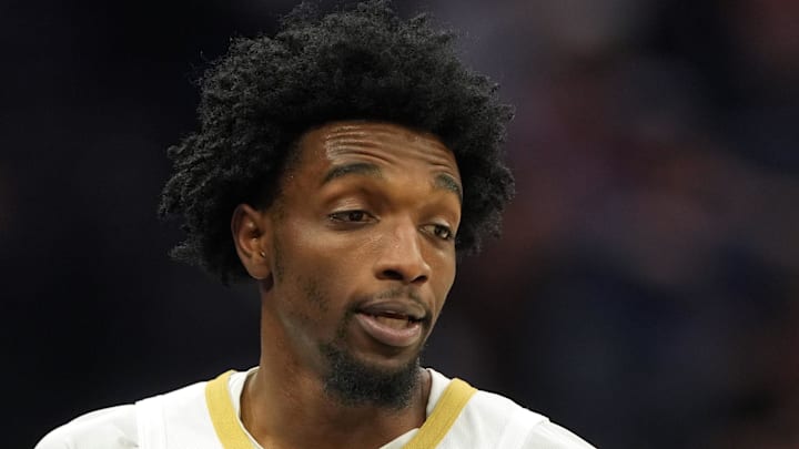 Apr 3, 2026; Sacramento, California, USA; New Orleans Pelicans forward Herbert Jones (left) talks with interim head coach James Borrego (right) during the first quarter against the Sacramento Kings at Golden 1 Center. Mandatory Credit: Darren Yamashita-Imagn Images