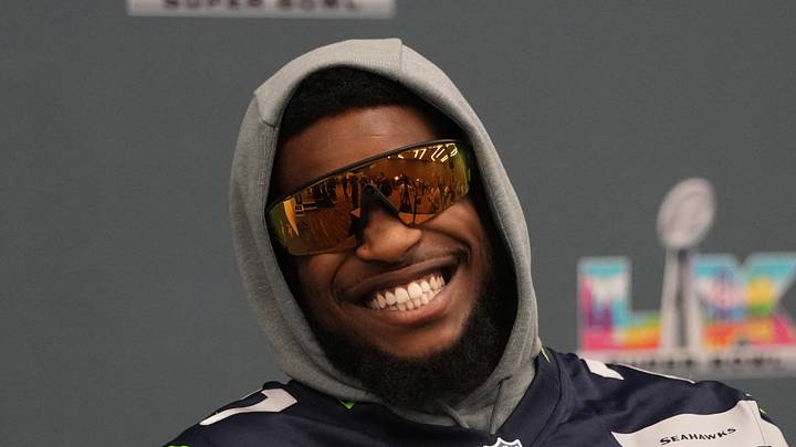 Seattle Seahawks cornerback Devon Witherspoon talks to the media