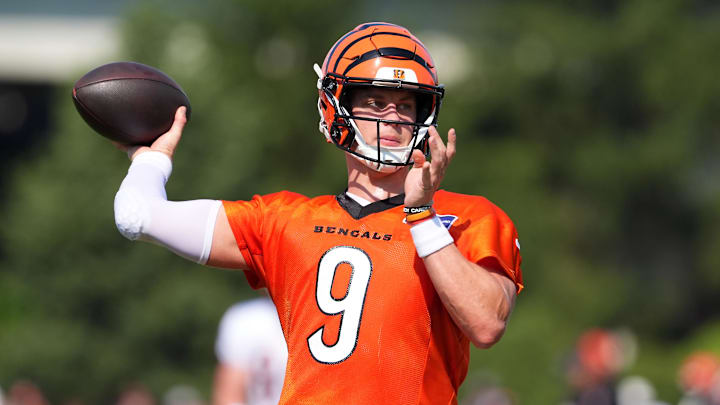 Jul 25, 2025; Cincinnati, OH, USA; Cincinnati Bengals quarterback Joe Burrow (9) throws during training camp practice. Mandatory Credit: Kareem Elgazzar-Imagn Images