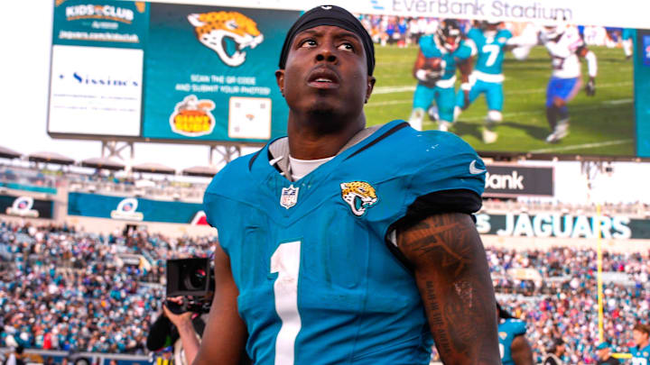 Jacksonville Jaguars running back Travis Etienne Jr. (1) walks off the field after losing to the Bills during an NFL football AFC Wild Card playoff matchup, Sunday, Jan. 11, 2026, in Jacksonville, Fla. Bills lead 10-7 at the half over the Jaguars. The Bills defeated the Jaguars 27-24. [Doug Engle/Florida Times-Union]