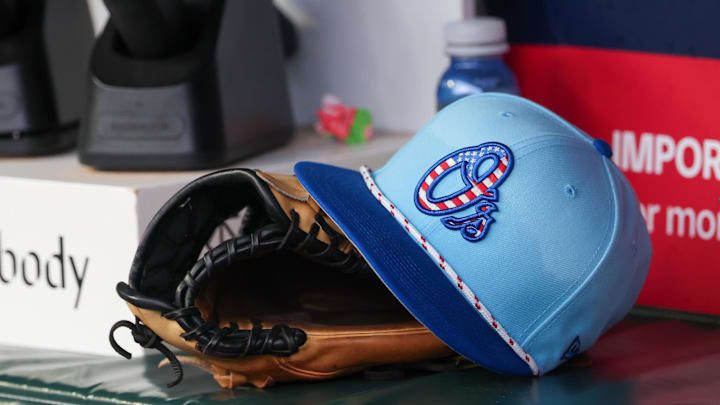 Jul 4, 2025; Atlanta, Georgia, USA; A detailed view of the Baltimore Orioles 4th of July hat in the dugout against the Atlanta Braves in the third inning at Truist Park. 