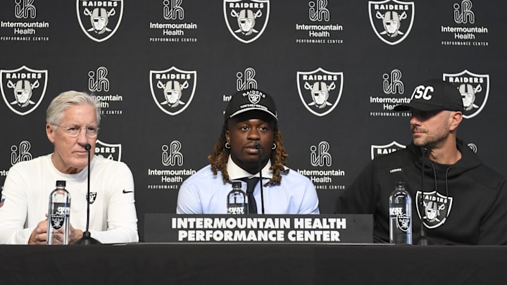 Apr 25, 2025; Henderson, NV, USA; (L-R) Las Vegas Raiders head coach Pete Carroll, Ashton Jeanty and general manager John Spytek during a news conference introducing Jeanty as the first round draft pick in the 2025 NFL Draft at Intermountain Health Performance Center. Mandatory Credit: Candice Ward-Imagn Images