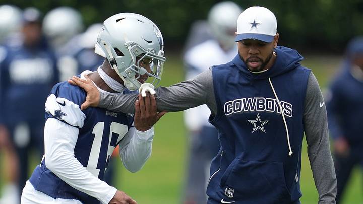 Dallas Cowboys cornerback Caleb Downs is coached through a drill with defensive coordinator Christian Parker Dallas Cowboys cornerback Caleb Downs is coached through a drill with defensive coordinator Christian Parker