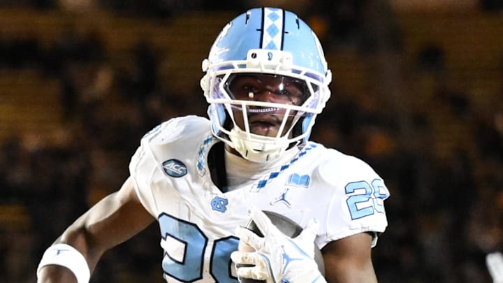 Oct 17, 2025; Berkeley, California, USA; North Carolina Tar Heels running back Benjamin Hall (28) runs for a touchdown against the California Golden Bears in the first quarter at California Memorial Stadium. Mandatory Credit: Eakin Howard-Imagn Images