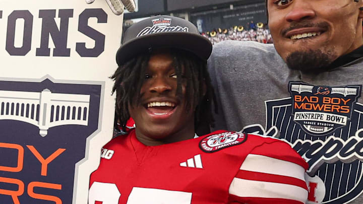 Dec 28, 2024; Bronx, NY, USA; Nebraska Cornhuskers running back Kenneth Williams (25) celebrates with teammates after the game against the Boston College Eagles at Yankee Stadium. Mandatory Credit: Vincent Carchietta-Imagn Images