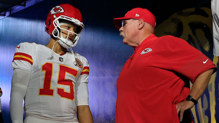 Kansas City Chiefs quarterback Patrick Mahomes (15) talks with head coach Andy Reid with tight end Travis Kelce (87) before an NFL football matchup at EverBank Stadium, Monday, Oct. 6, 2025, in Jacksonville, Fla. The Jacksonville Jaguars edged the Kansas City Chiefs 31-28. 