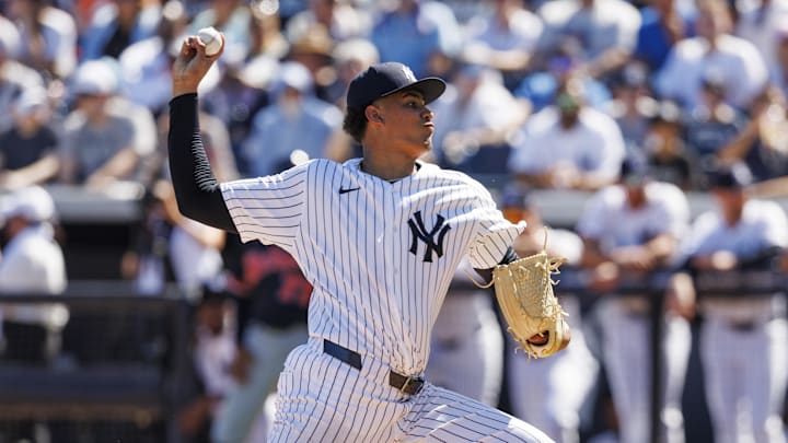 Feb 21, 2026; Tampa, Florida, USA; New York Yankees pitcher Carlos Lagrange (84) throws a pitch against the Detroit Tigers during the second inning in a Spring Training game at George M. Steinbrenner Field. Mandatory Credit: Morgan Tencza-Imagn Images