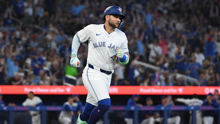 Jul 6, 2025; Toronto, Ontario, CAN;  Toronto Blue Jays shortstop Bo Bichette (11) runs the bases after hitting a solo home run against the Los Angeles Angels in the fourth inning at Rogers Centre. 