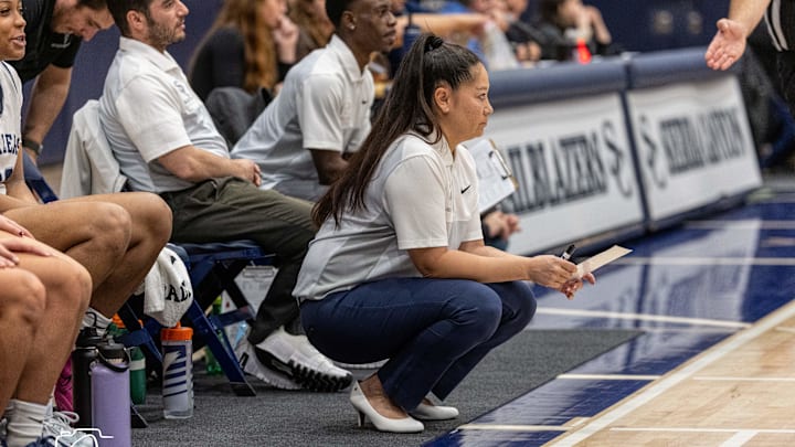 Sierra Canyon girls basketball coach Alicia Komaki watches on as her team plays at home against Harvard-Westlake.