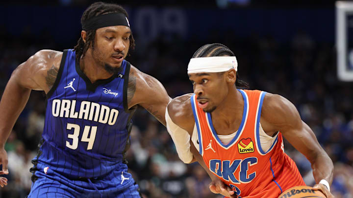 Dec 19, 2024; Orlando, Florida, USA;Oklahoma City Thunder guard Shai Gilgeous-Alexander (2) is guarded by Orlando Magic center Wendell Carter Jr. (34) in the third quarter at Kia Center. Mandatory Credit: Nathan Ray Seebeck-Imagn Images Dec 19, 2024; Orlando, Florida, USA;Oklahoma City Thunder guard Shai Gilgeous-Alexander (2) is guarded by Orlando Magic center Wendell Carter Jr. (34) in the third quarter at Kia Center. Mandatory Credit: Nathan Ray Seebeck-Imagn Images