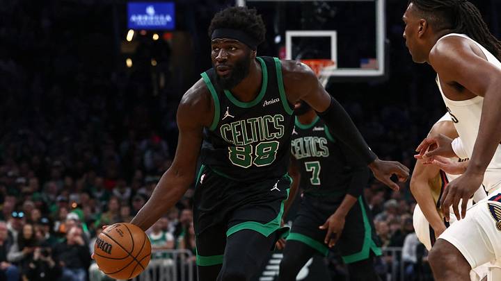 Apr 10, 2026; Boston, Massachusetts, USA; Boston Celtics center Neemias Queta (88) brings the ball up court against the New Orleans Pelicans during the first quarter at TD Garden. Mandatory Credit: Winslow Townson-Imagn Images