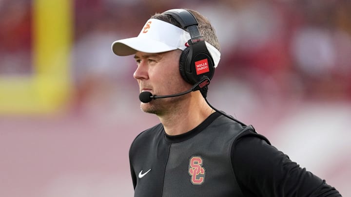 Aug 30, 2025; Los Angeles, California, USA; Southern California Trojans head coach Lincoln Riley watches from the sidelines against the Missouri State Bears in the first half at United Airlines Field at Los Angeles Memorial Coliseum. Mandatory Credit: Kirby Lee-Imagn Images