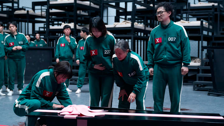 Park Sung-hoon as Cho Hyun-ju, Jo Yu-ri as Kim Jun-hee, Kang Ae-sim as Jang Geum-ja, Yang Dong-geun as Park Yong-sik in Squid Game season 3