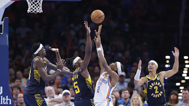 Mar 29, 2025; Oklahoma City, Oklahoma, USA; Oklahoma City Thunder guard Shai Gilgeous-Alexander (2) shoots as Indiana Pacers forward Jarace Walker (5) defends during the second half at Paycom Center. Mandatory Credit: Alonzo Adams-Imagn Images